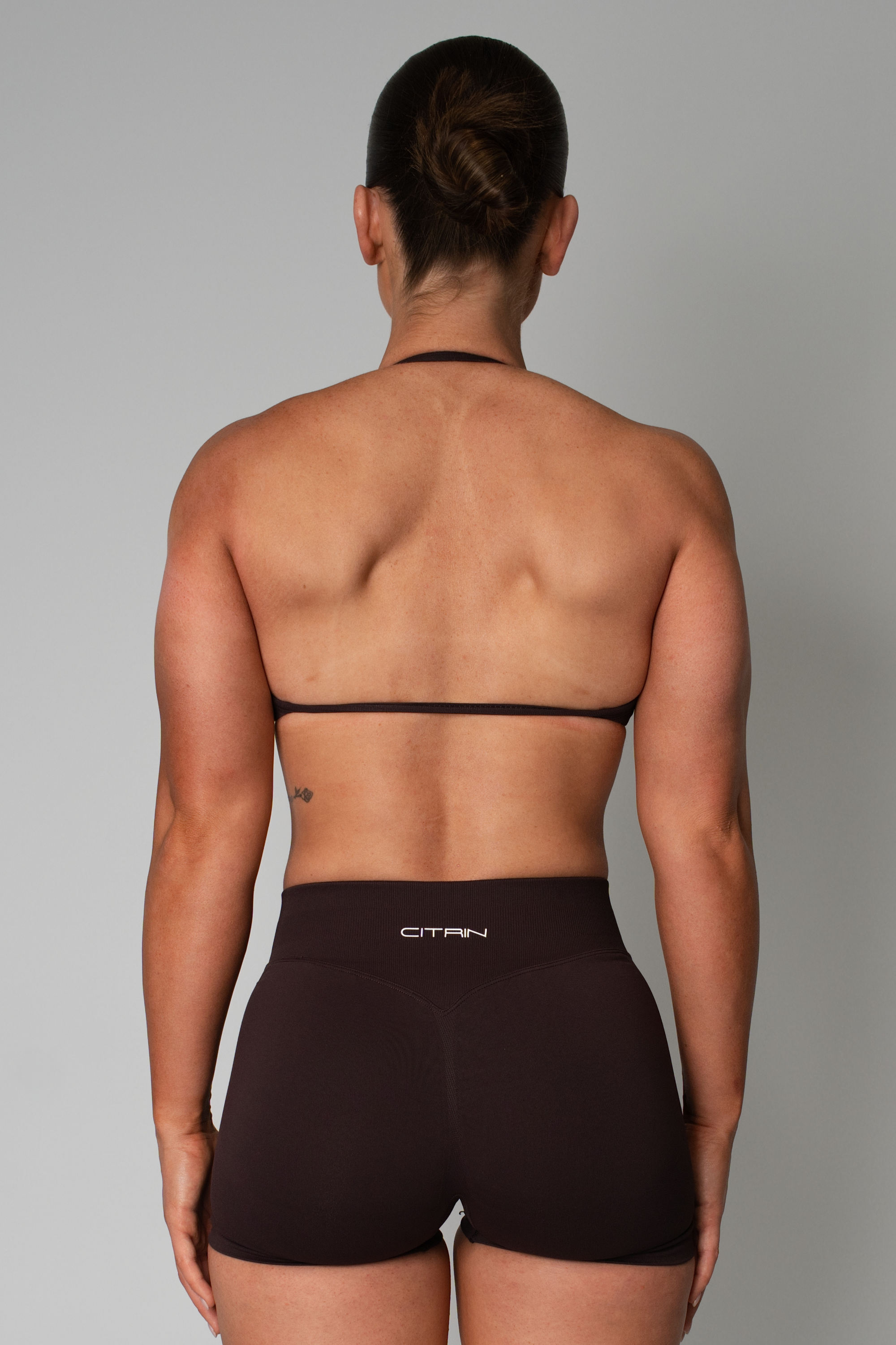TRUE SHAPE MINIMAL RUCHED HALTER CROP - DARK BROWN