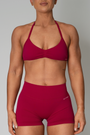 TRUE SHAPE MINIMAL RUCHED HALTER CROP - BERRY