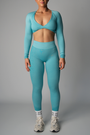 FADED SEAMLESS LONG SLEEVE TWIST CROP  - TEAL BLUE
